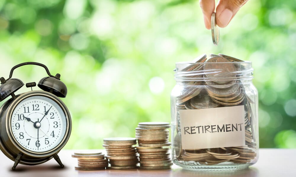 saving for retirement  glass jars with money