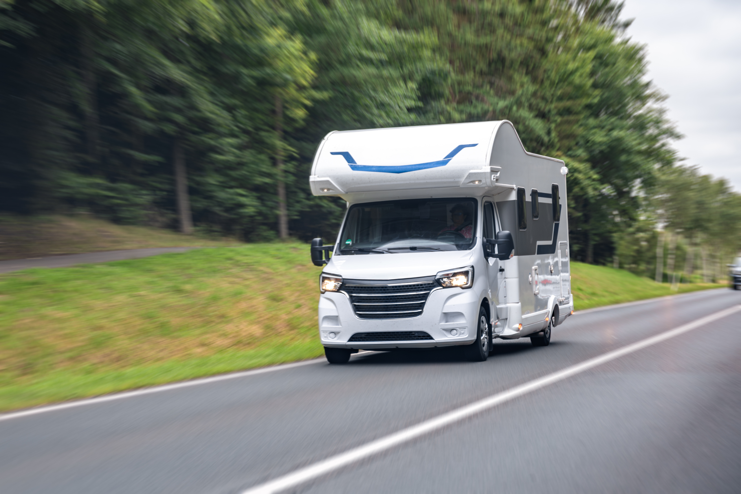 white rv on the road